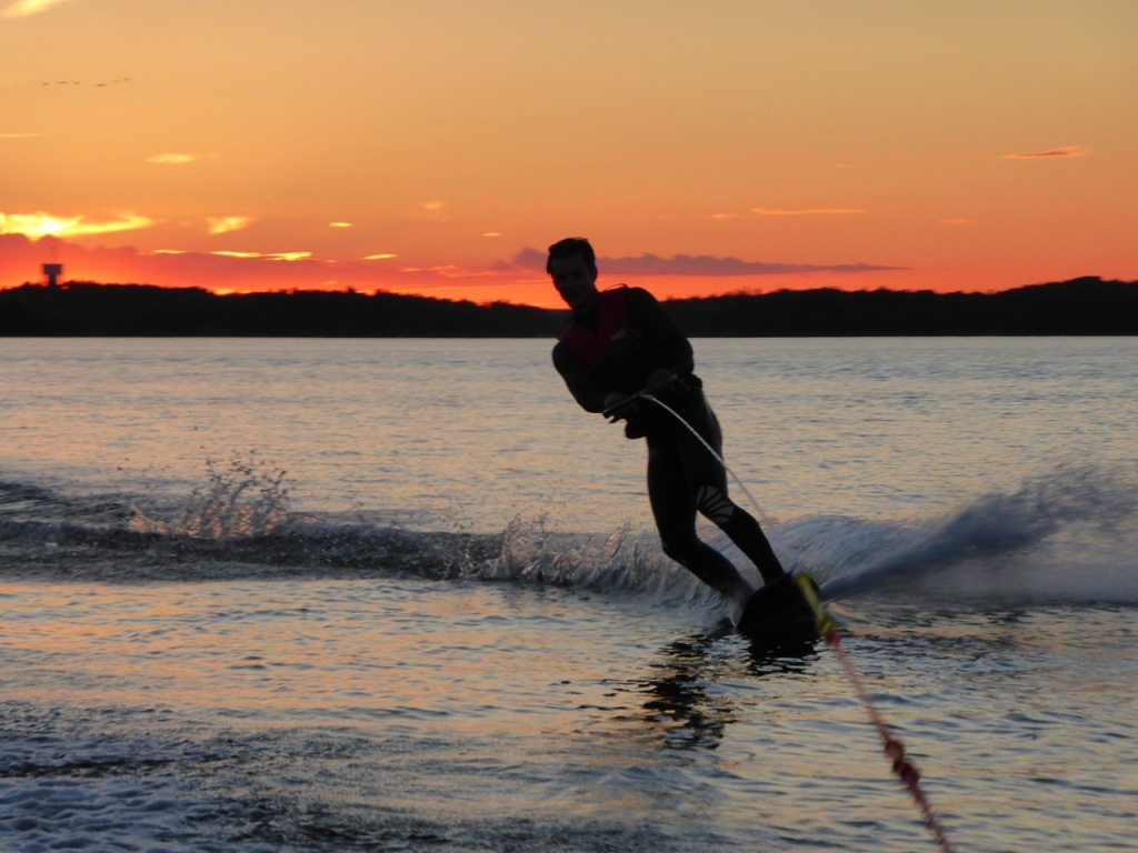 Wakeboarding at sunset